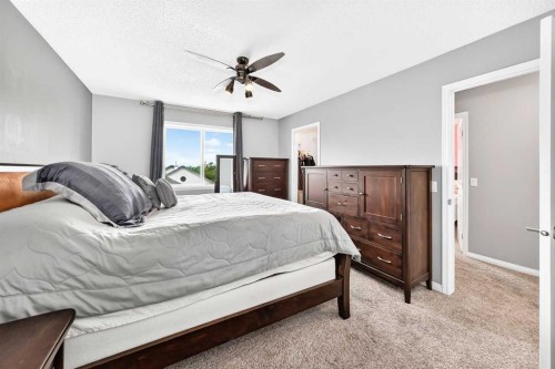 23 Thornbird Way Se, Airdrie, AB - Indoor Photo Showing Bedroom