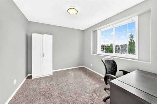 23 Thornbird Way Se, Airdrie, AB - Indoor Photo Showing Office