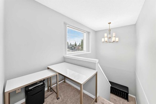 23 Thornbird Way Se, Airdrie, AB - Indoor Photo Showing Other Room