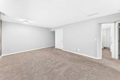 23 Thornbird Way Se, Airdrie, AB - Indoor Photo Showing Other Room