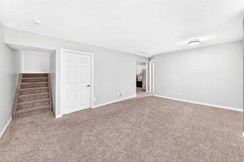 23 Thornbird Way Se, Airdrie, AB - Indoor Photo Showing Other Room