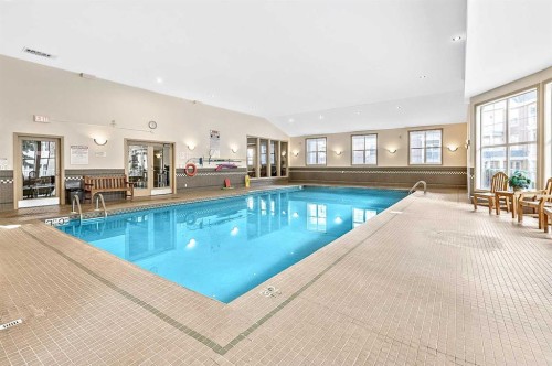 201-3650 Marda Link Sw, Calgary, AB - Indoor Photo Showing Other Room With In Ground Pool