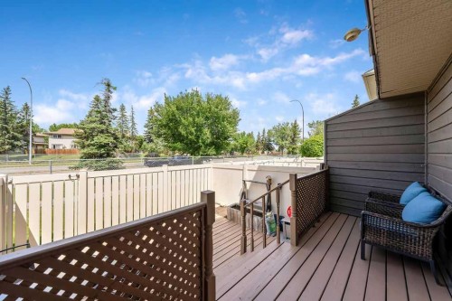 14-14736 Deerfield Drive Se, Calgary, AB - Outdoor With Deck Patio Veranda With Exterior