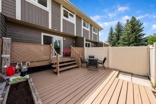 14-14736 Deerfield Drive Se, Calgary, AB - Outdoor With Deck Patio Veranda With Exterior