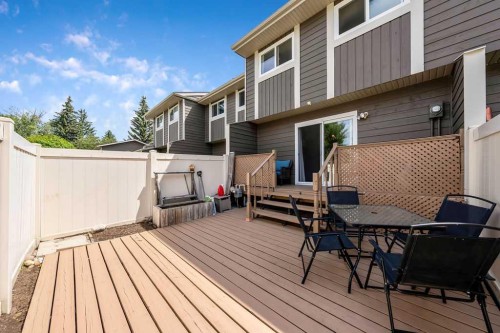 14-14736 Deerfield Drive Se, Calgary, AB - Outdoor With Deck Patio Veranda With Exterior