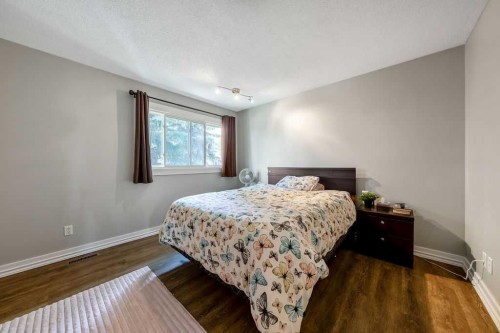 14-14736 Deerfield Drive Se, Calgary, AB - Indoor Photo Showing Bedroom