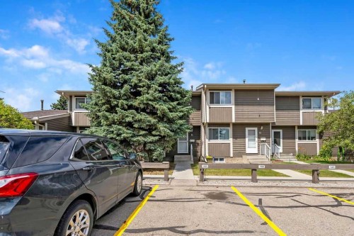 14-14736 Deerfield Drive Se, Calgary, AB - Outdoor With Facade