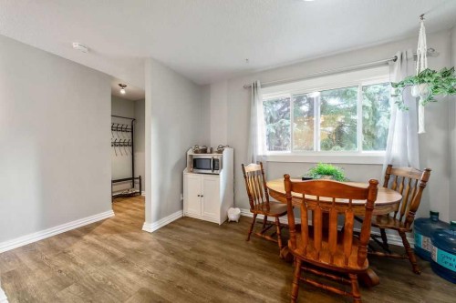 14-14736 Deerfield Drive Se, Calgary, AB - Indoor Photo Showing Dining Room
