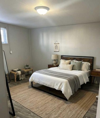 1522 20 Avenue, Didsbury, AB - Indoor Photo Showing Bedroom