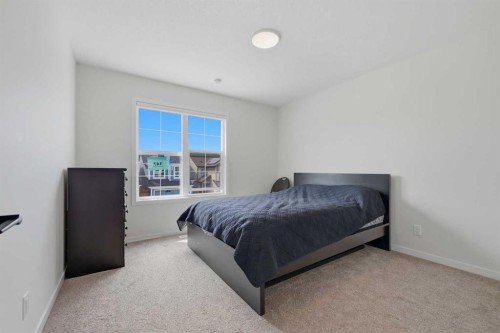 147 Magnolia Path Se, Calgary, AB - Indoor Photo Showing Bedroom