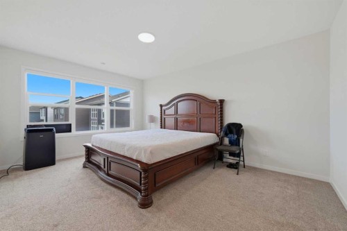 147 Magnolia Path Se, Calgary, AB - Indoor Photo Showing Bedroom