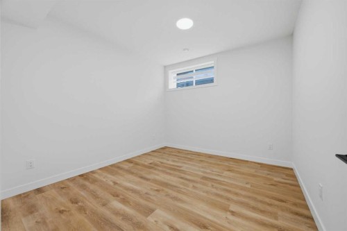 147 Magnolia Path Se, Calgary, AB - Indoor Photo Showing Other Room
