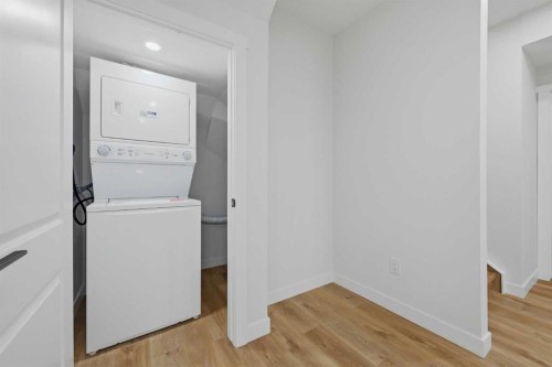 147 Magnolia Path Se, Calgary, AB - Indoor Photo Showing Laundry Room