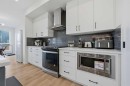 147 Magnolia Path Se, Calgary, AB  - Indoor Photo Showing Kitchen With Upgraded Kitchen 