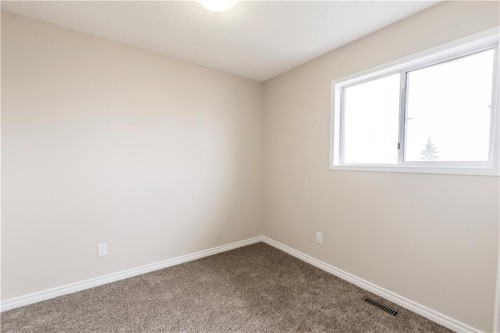 1019 Smith Avenue, Crossfield, AB - Indoor Photo Showing Other Room