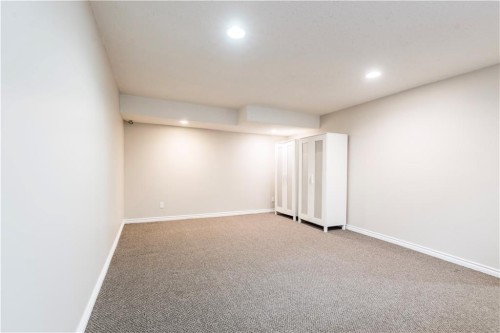 1019 Smith Avenue, Crossfield, AB - Indoor Photo Showing Other Room