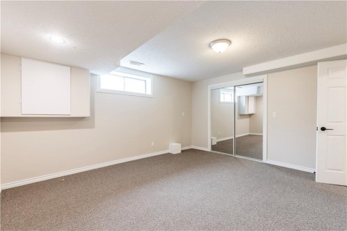 1019 Smith Avenue, Crossfield, AB - Indoor Photo Showing Other Room
