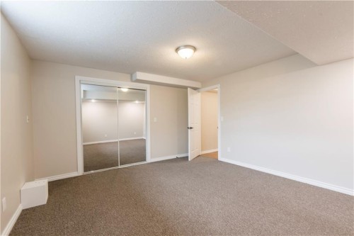 1019 Smith Avenue, Crossfield, AB - Indoor Photo Showing Other Room