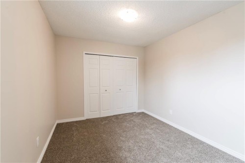 1019 Smith Avenue, Crossfield, AB - Indoor Photo Showing Other Room