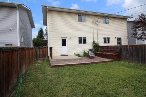 1019 Smith Avenue, Crossfield, AB - Outdoor With Exterior