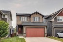150 Fireside Bend, Cochrane, AB  - Outdoor With Facade 