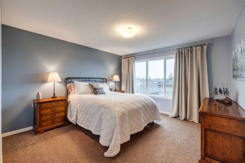 150 Fireside Bend, Cochrane, AB - Indoor Photo Showing Bedroom