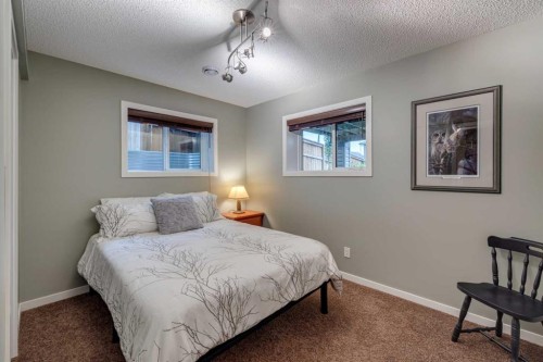 150 Fireside Bend, Cochrane, AB - Indoor Photo Showing Bedroom