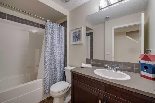 150 Fireside Bend, Cochrane, AB - Indoor Photo Showing Bathroom