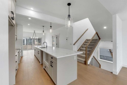 39 Heritage Ridge, Cochrane, AB - Indoor Photo Showing Kitchen With Upgraded Kitchen