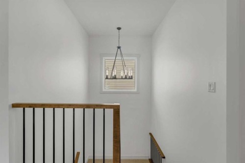 39 Heritage Ridge, Cochrane, AB - Indoor Photo Showing Other Room