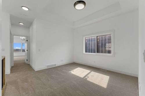 39 Heritage Ridge, Cochrane, AB - Indoor Photo Showing Other Room