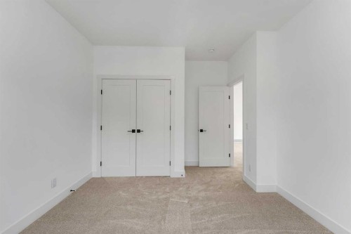 39 Heritage Ridge, Cochrane, AB - Indoor Photo Showing Other Room