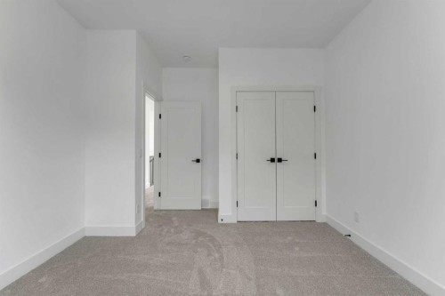 39 Heritage Ridge, Cochrane, AB - Indoor Photo Showing Other Room