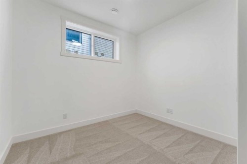 39 Heritage Ridge, Cochrane, AB - Indoor Photo Showing Other Room