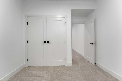 39 Heritage Ridge, Cochrane, AB - Indoor Photo Showing Other Room