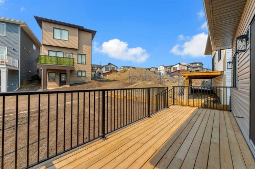 39 Heritage Ridge, Cochrane, AB - Outdoor With Deck Patio Veranda With Exterior