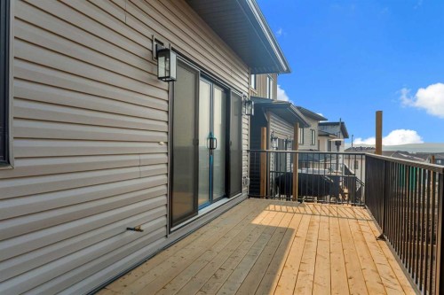 39 Heritage Ridge, Cochrane, AB - Outdoor With Deck Patio Veranda With Exterior