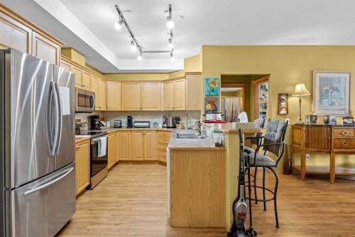 225-15 Everstone Drive Sw, Calgary, AB - Indoor Photo Showing Kitchen With Stainless Steel Kitchen