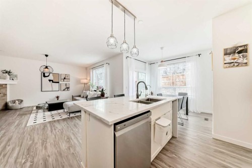 169 Aspenshire Drive Sw, Calgary, AB - Indoor Photo Showing Kitchen With Double Sink