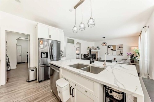 169 Aspenshire Drive Sw, Calgary, AB - Indoor Photo Showing Kitchen With Stainless Steel Kitchen With Double Sink