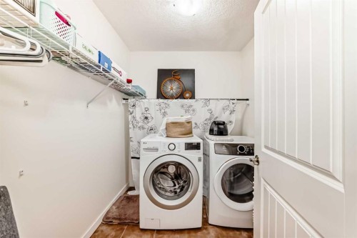 169 Aspenshire Drive Sw, Calgary, AB - Indoor Photo Showing Laundry Room