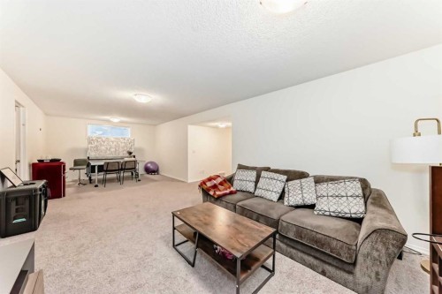 169 Aspenshire Drive Sw, Calgary, AB - Indoor Photo Showing Living Room