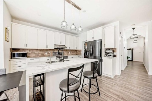 169 Aspenshire Drive Sw, Calgary, AB - Indoor Photo Showing Kitchen With Double Sink