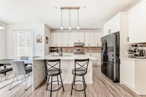 169 Aspenshire Drive Sw, Calgary, AB - Indoor Photo Showing Kitchen With Stainless Steel Kitchen With Double Sink