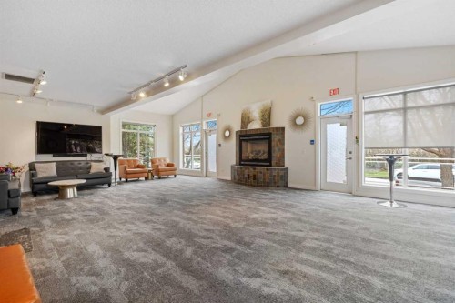 5208-14 Hemlock Crescent Sw, Calgary, AB - Indoor With Fireplace