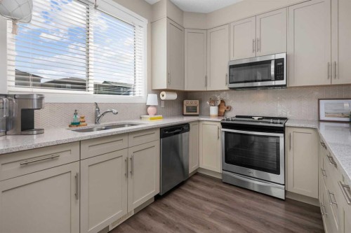 446 Walgrove Way Se, Calgary, AB - Indoor Photo Showing Kitchen With Stainless Steel Kitchen With Double Sink