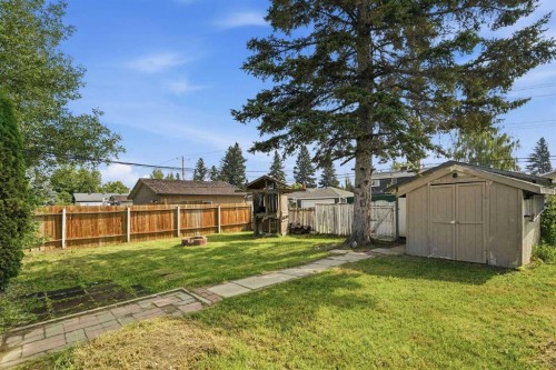 9032 Fairmount Drive Se, Calgary, AB - Outdoor With Backyard