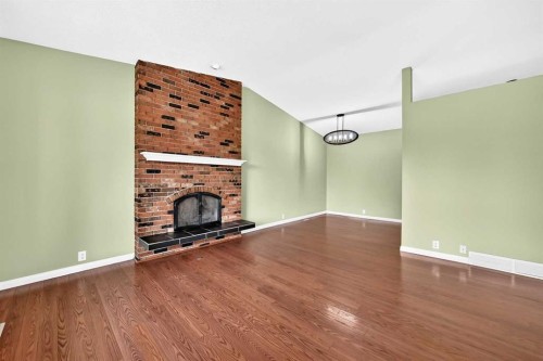 11335 Braeside Drive Sw, Calgary, AB - Indoor With Fireplace