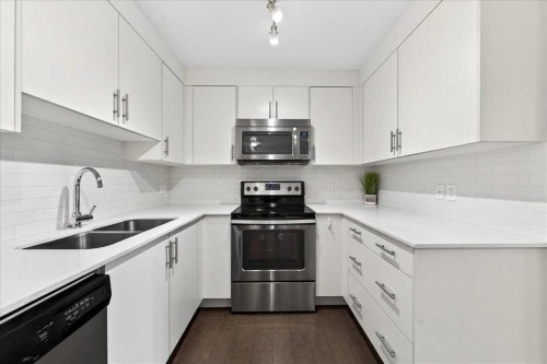 3306-302 Skyview Ranch Drive Ne, Calgary, AB - Indoor Photo Showing Kitchen With Stainless Steel Kitchen With Double Sink With Upgraded Kitchen