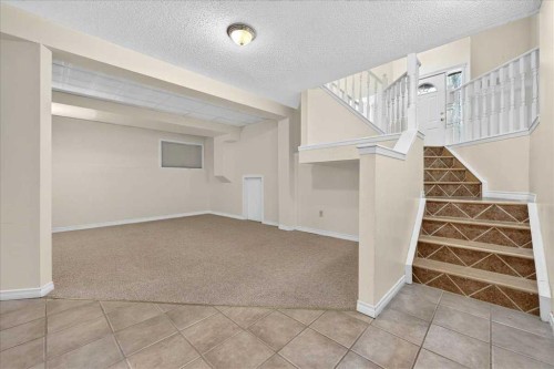 67 Rivercrest Circle Se, Calgary, AB - Indoor Photo Showing Other Room